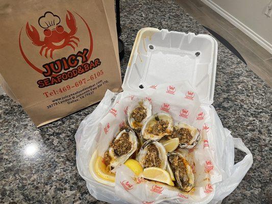 Oysters steamed medium with garlic seasoning and garlic butter