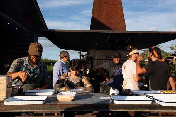 Our kitchen staff plating for our ticketed Chef's Table dinner series.