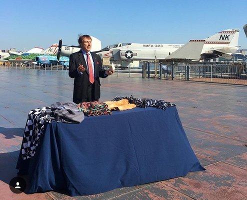 Founder and President of The Forum Group, Frank Fusaro, speaking at The Intrepid Aircraft Carrier.