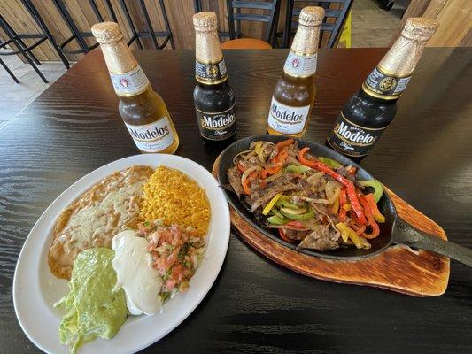 Carne Asada Fajitas dinner plate and imported beer