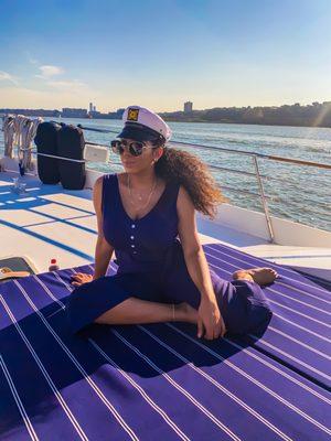 Soaking in the Sun with my Captain's hat - courtesy of the crew members !