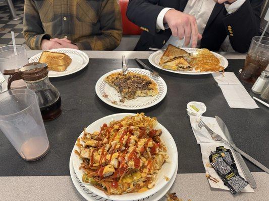 chicken melt has brown bowl double diced smothered and peppered with a scrambled egg