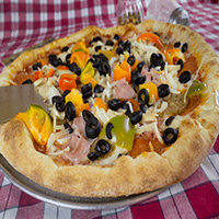 Galena Deluxe- Pepperoni, Sausage, Mushrooms, Green Peppers, Onions, Black Olives, and Ham.