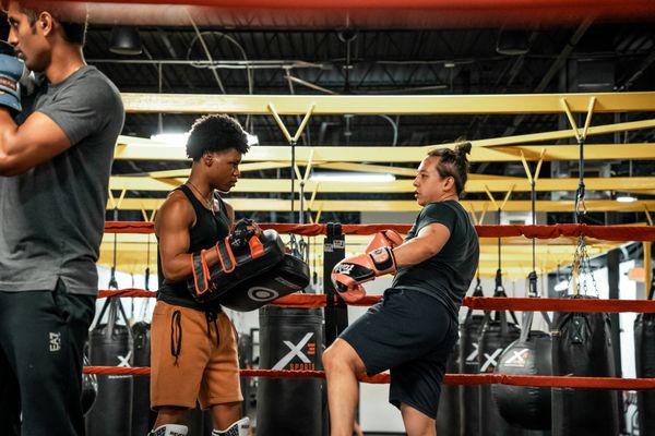 Training Muay Thai and sparring at X3 Sports West Midtown location.