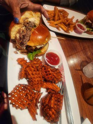 Bacon cheeseburger and sweet potato waffle fries.