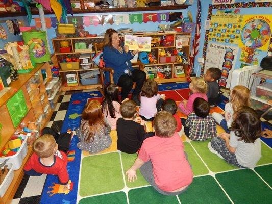 Mrs. Flanakin reading a story