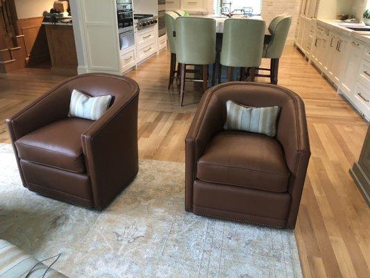 Custom made swivel leather chairs.