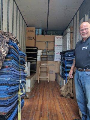 We carefully and professionally protect, wrap, pack and secure your belongings. Like this truck here, 6,800 pounds of our customers valuable