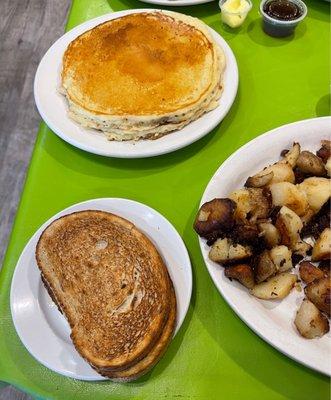 Rye toast with butter and fluffy pancakes