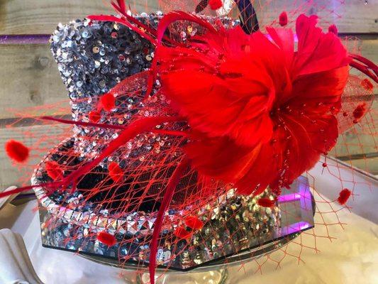 Blingy top hat with red flower