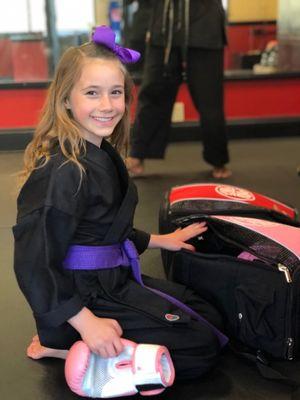 Her first time wearing her black gi; such an honor!