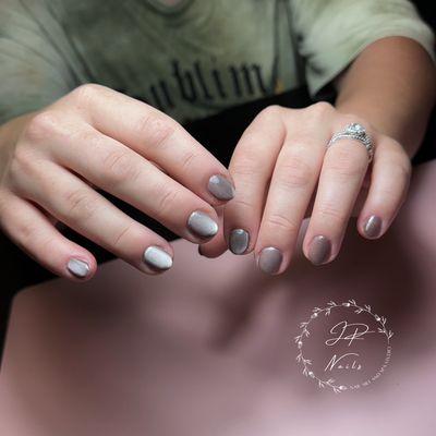 Japanese-style manicure with an overlay of natural nails.