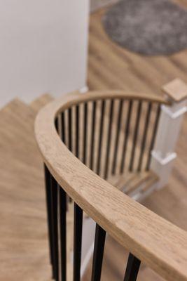 Solid White oak treads, 6084 handrail and black iron bars