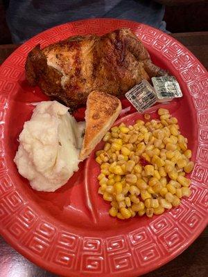 1/2 rotisserie chicken, mashed potatoes, and corn