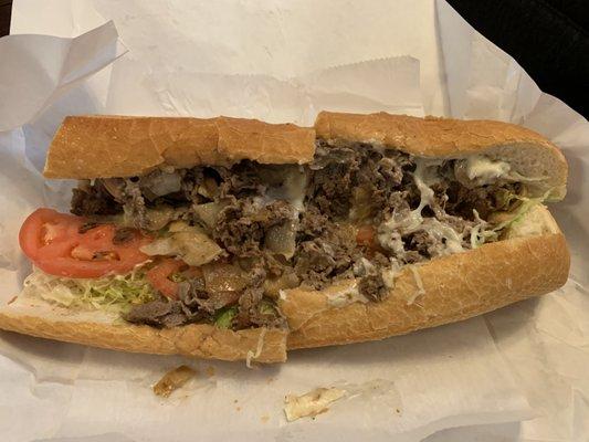 Steak & cheese with mushroom, onions, lettuce, tomato, mayo. One of the best in the area!