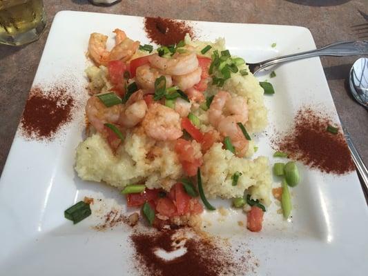 While pretty and somewhat tasty, this is NOT shrimp and grits. More like garlic shrimp on top of porridge.