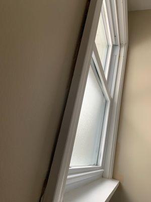 Improperly installed windows resulting in a 1 inch gap from window to wall.