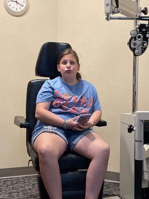 Daughter getting her eye exam ..