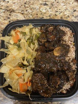 Oxtails loess and rice and cabbage