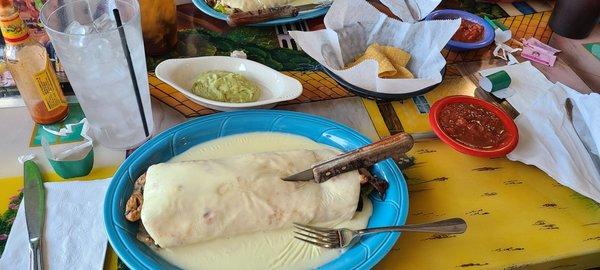 Chicken Laredo Burito, guacamole and chips.