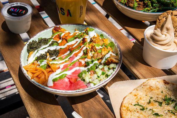 Most popular bowl: Tikka Chance on Me + soft serve, cucumber raita and garlic naan