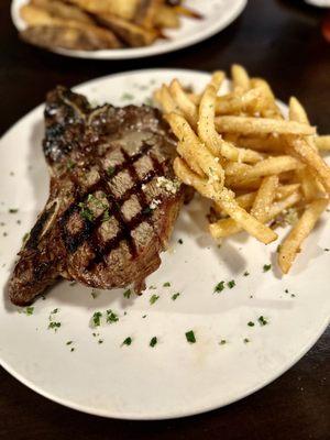 Bone-on ribeye, medium rare w/ truffle fries