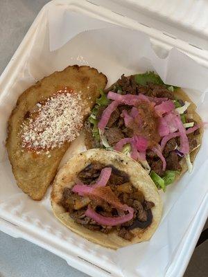 Cheese empanada, a asada panuchos, and a asada taco