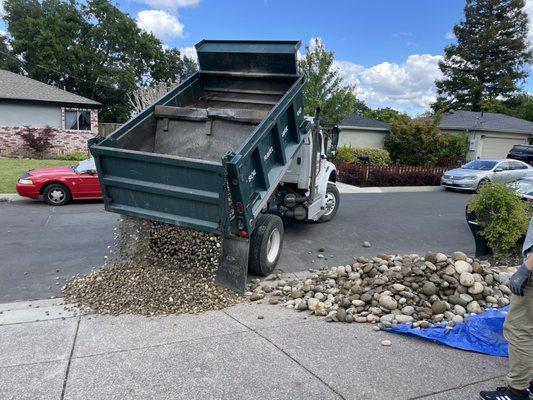 My 4 cubic yard of rocks dropped off onto my driveway