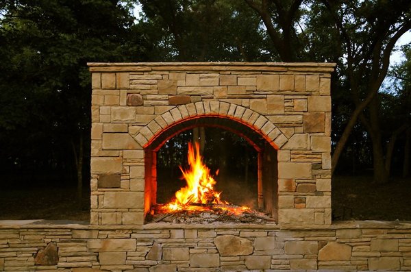 Outdoor fireplaces help warm up chilly nights in McKinney Texas