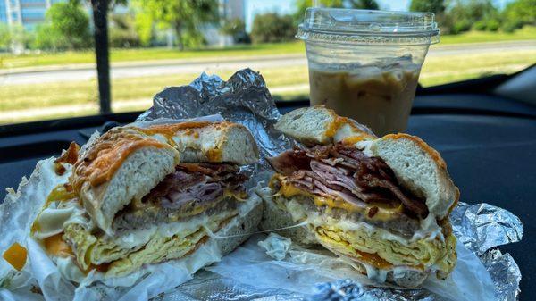 Empire on a cheddar bagel with jalapeño cream cheese and an iced chai latte.