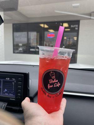 Strawberry fruit tea with strawberry popping boba, size large $4.99 plus $0.99 for the boba