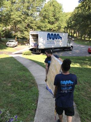 Loading TV into the truck