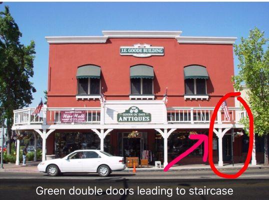 I'm located in the office space above Good 'Ol Days Antiques. Green double doors to the right lead you upstairs.