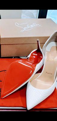 Glossy red rubber sole guards on Christian Louboutin