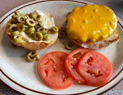 Olive burger with cheese.