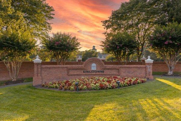 Kingstowne community sign at sunset.