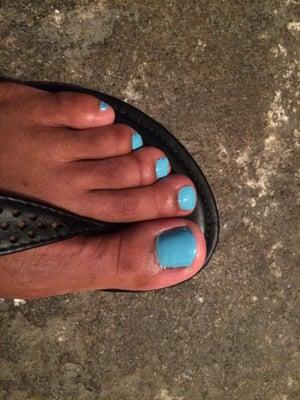 The worst pedicure I've ever received. Notice the lopsided nails.