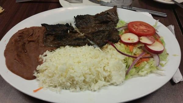 Carne asada! Just get it. It's so damn good. More flavor than you know what to do with. It wasn't cut in half, I got impatient.