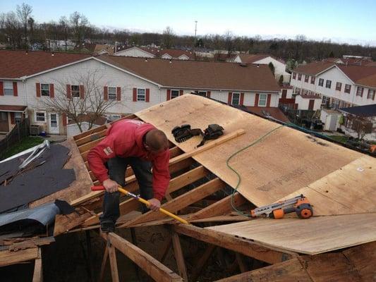 Removed Existing roofing system and entire rotted wood decking, Installed New 1/2" CDX Plywood Decking