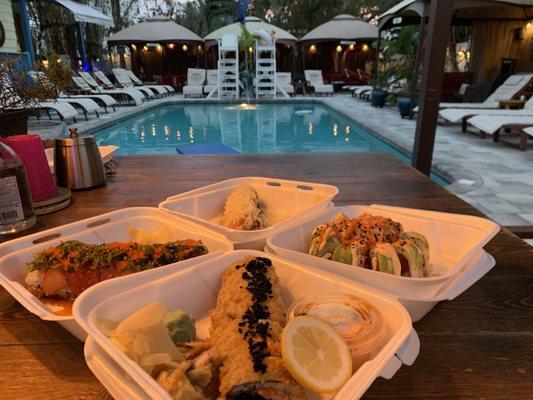 Sushi to go, enjoyed by the pool