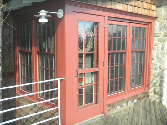 Composit window with factory red painted exterior