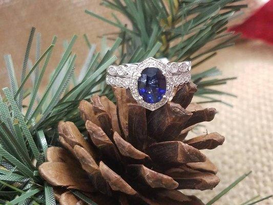 Genuine Oval Cut Blue Sapphire and Round Diamond Bridal Set in 14 Karat White Gold