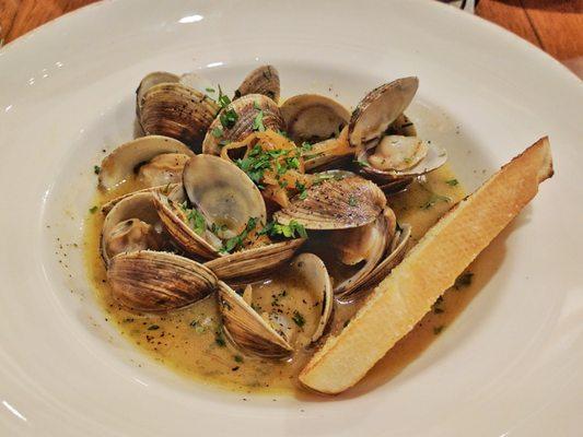 Brick oven roasted local clams in broth.