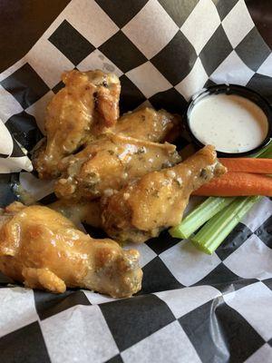 Garlic Parmesan wings with ranch and vegetables. We chose to have a salad for two extra dollars.