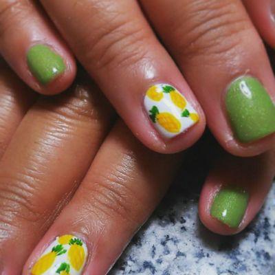 Gel manicure with pineapple nail design