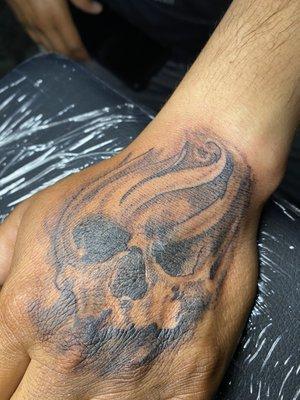 Skull on hand