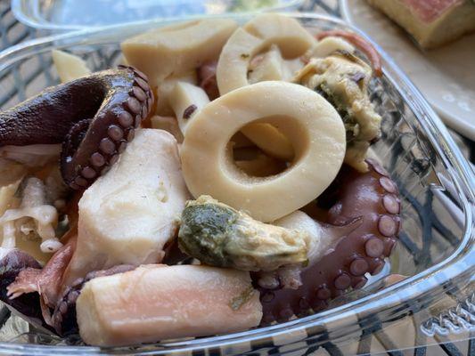 "Imported Seafood Salad". On a menu in Italy, "fruitti di mare".