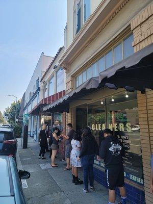 Free Comic book day on 8/24/21 at Dr. Comics & Mr. Games. Line of customers waiting to get in.