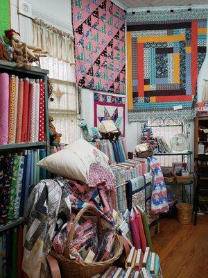 Lots of quilts on display.