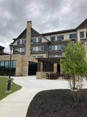 Outside view of the restaurant and hotel. Restaurant is on the bottom left.